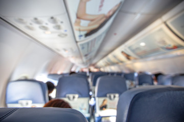 The background of the chair is blurred, the passenger seat in the plane, is beautiful to another.