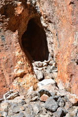 Tibet, cave in Geoglyph - the ears of the horse on cape Tomchok on lake Nam-Tso (Nam Tso). Place of power