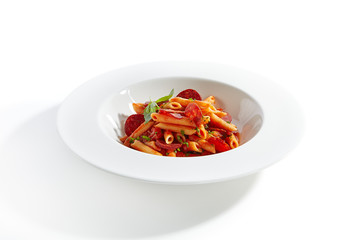 Italian Pasta with Salami, Cold Smoked Tomatoes Close Up
