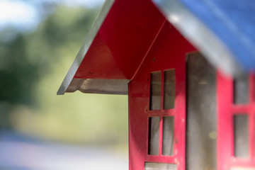Closeup red bird house