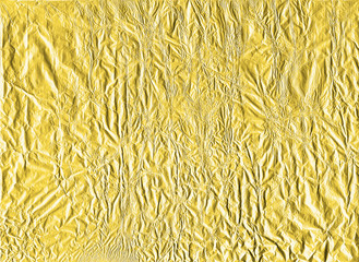 Shiny yellow gold crumpled wrapping paper foil texture for wallpaper decoration element background, stock photo image