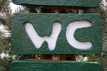 wc banner pointing where the water close is