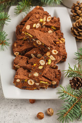 Italian Christmas dessert panforte with nuts, chocolate and candied fruits. Christmas background