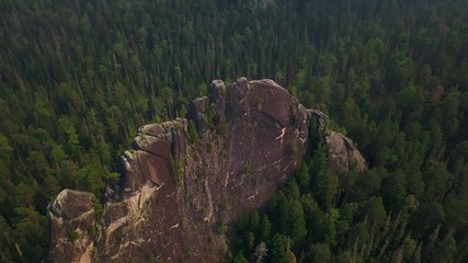 Aerial view of unique rock sculptures at Krasnoyarsk stolby drone footage