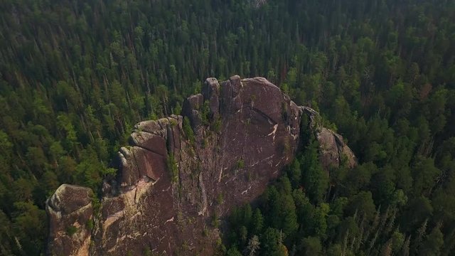 Aerial view of unique rock sculptures at Krasnoyarsk stolby drone footage