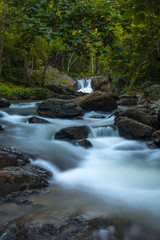 natural waterfall stream in the tropical forest