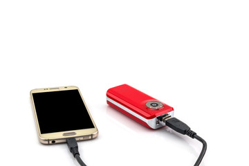 Red power bank recharging isolated on white background