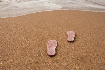 Fototapeta na wymiar Take off your shoes with sea background