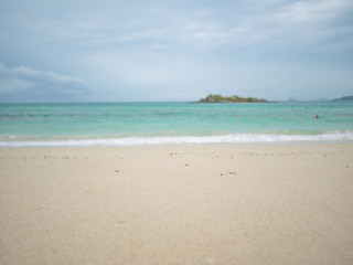 Fototapeta na wymiar Tropical Idyllic ocean Blue sky and beautiful Beach in vacation time