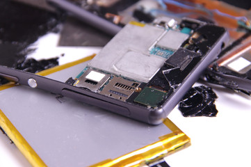 Broken cellphone in pieces