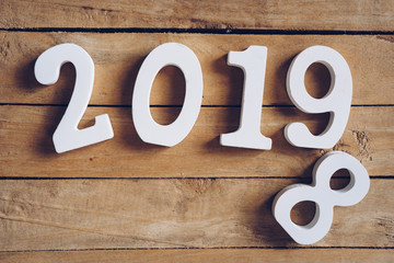 New year 2019 word on wooden table. New Year concept.