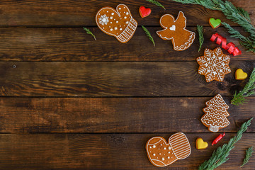 Christmas homemade gingerbread cookies on wooden table