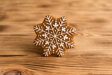 Christmas homemade gingerbread cookies on wooden table