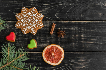 Christmas homemade gingerbread cookies on wooden table