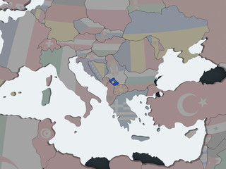 Kosovo with flag on globe