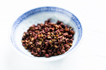 sichuan peppercorns in as bowl