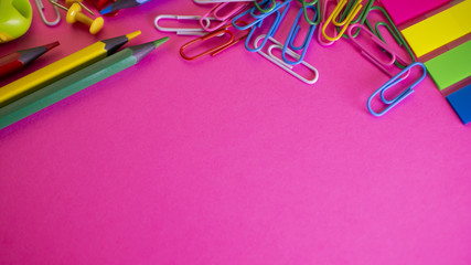 School supplies on pink background