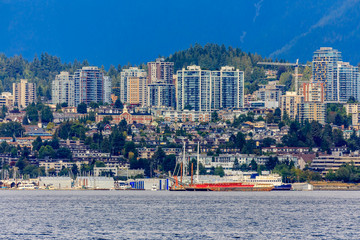 Vancouver North Shore skyline and waterfront with Grouse mountain in British Columbia Canada