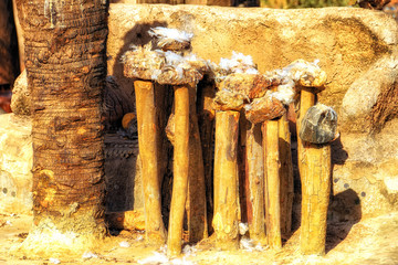 Chicken Feathers And Animal Bones Cover A Shrine Dedicated To The Ancestors, Ghana