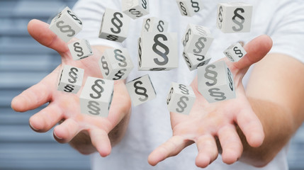 Businessman using 3D rendering law cubes