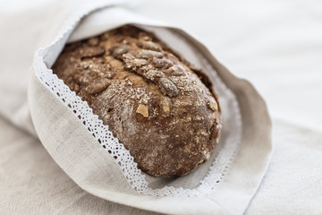 Fresh tasty wheat wholegrain brown bread with pumpkin seeds