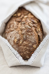 Fresh tasty wheat wholegrain brown bread with pumpkin seeds