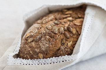 Fresh tasty wheat wholegrain brown bread with pumpkin seeds