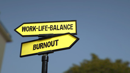 A road sign with work-life-balance burnout words . 3d image. 