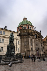 Fototapeta na wymiar Church and traditional buildings in Prague city