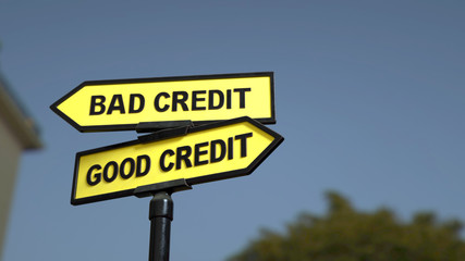 A road sign with bad credit good credit words . 3d image.