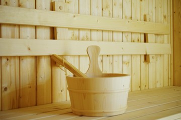 Fototapeta na wymiar wooden sauna bucket accessories interior of sauna spa
