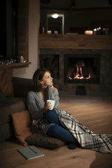 Obraz premium A Woman Enjoying Winter at Home