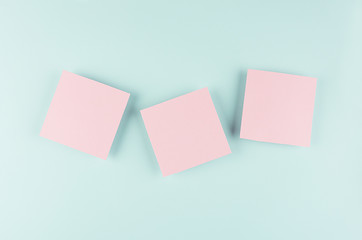 Halloween cartoon mock up for advertising, design, cover - pink paper squares on pastel mint background.