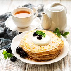 Delicious pancakes with blackberries