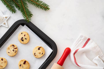 Christmas cookies with nuts and cranberries. Christmas decoration. Top view. Copy space.