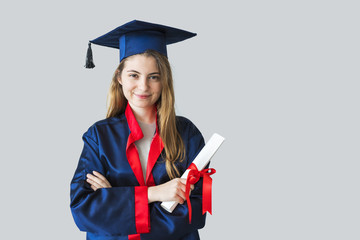 Young female student graduating from university