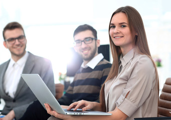 Obraz premium business woman on the background of colleagues