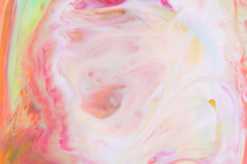 Fluid art. Holographic color background. Psychedelic blurred background. Abstract pattern with paints on liquid