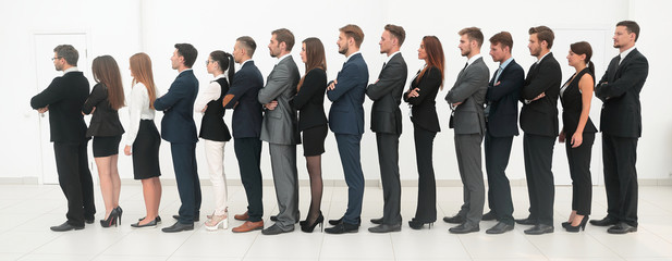 Obraz premium large business team standing one behind the other.