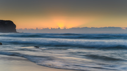 Fototapeta na wymiar Sunrise by the Sea