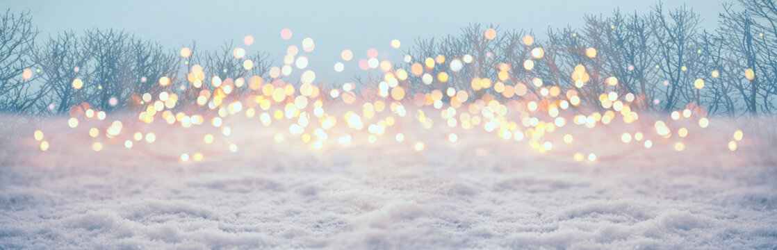 Magic winter landscape with snow and golden bokeh lights  -  Banner, Panorama, Background