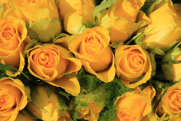 Yellow rose wedding arrangement