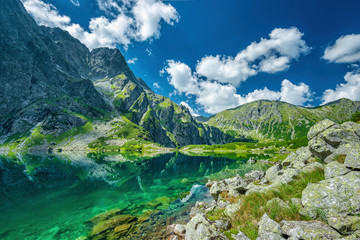 Fototapeta premium Black lake under Rysy peak, Tatra Mountains, Poland