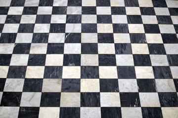 Antique checkered marble floor, black and white tiled background
