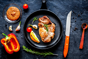 concept cooked steak on dark background top view