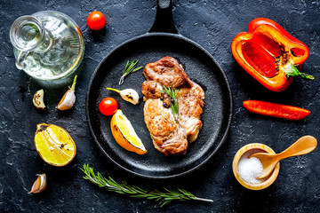 concept cooked steak on dark background top view