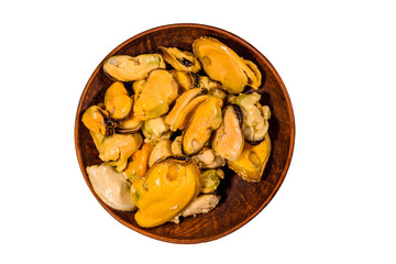 Ceramic plate with prepared mussels isolated on a white background