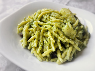 Italian trofie pasta with traditional pesto sauce