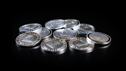 Litecoin Crypto Currency. Coins on a Dark Background