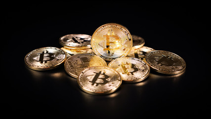 Bitcoin Crypto Currency. Coins on a Dark Background